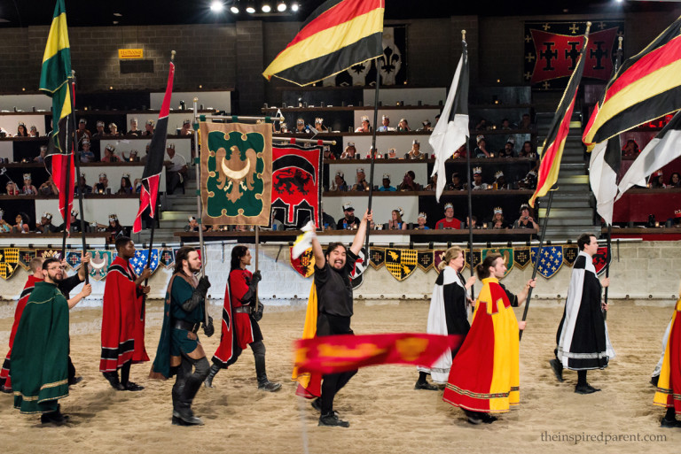 Our awesome server (center) took part in the opening ceremony &amp; he made sure to wave to our section to get all of us cheering for the Red & Yellow Knight. He made our dining experience such a treat!